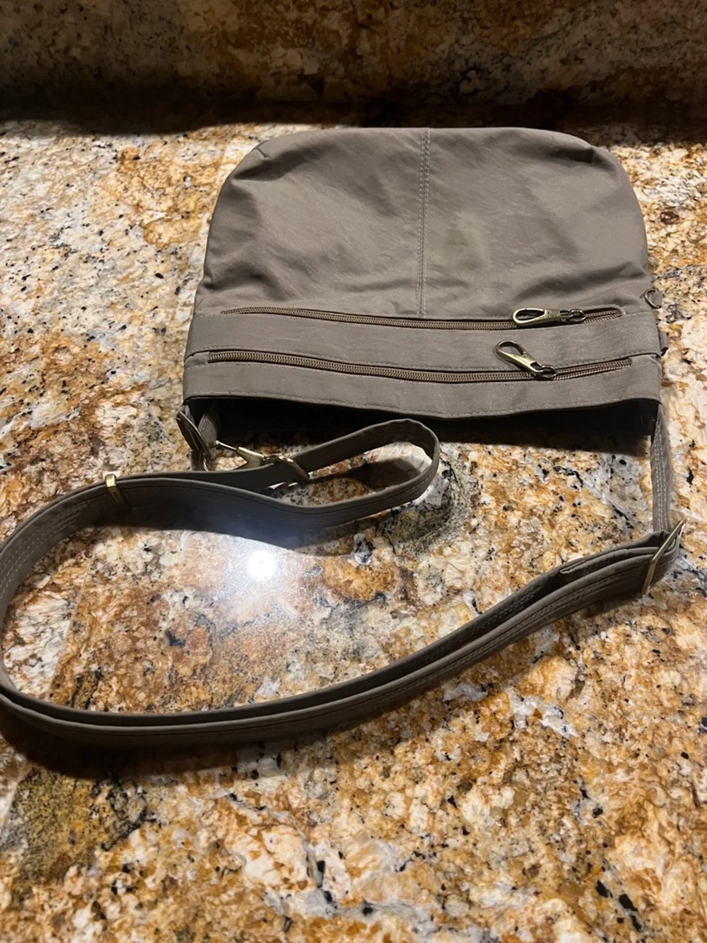 Travelon Men's Black and Silver Zipper Pull Crossbody Bag